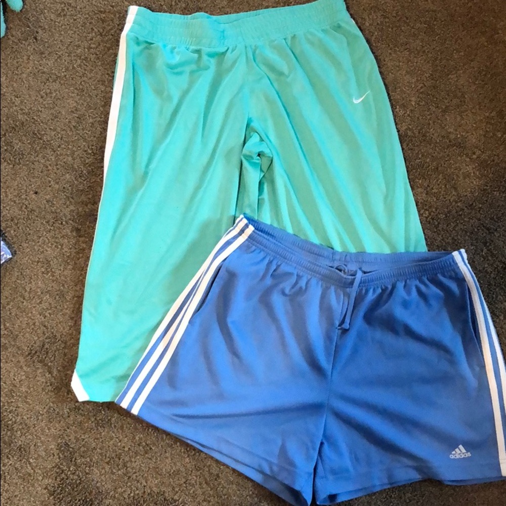 Nike capris and Adidas shorts both size large